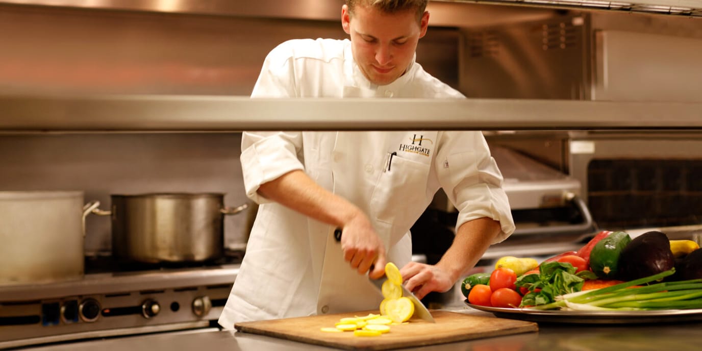 Chef preparing fresh ingredients in the kitchen
