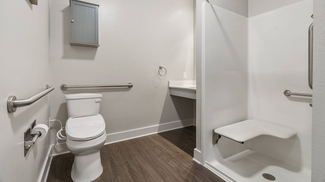 Clean bathroom space with safety features