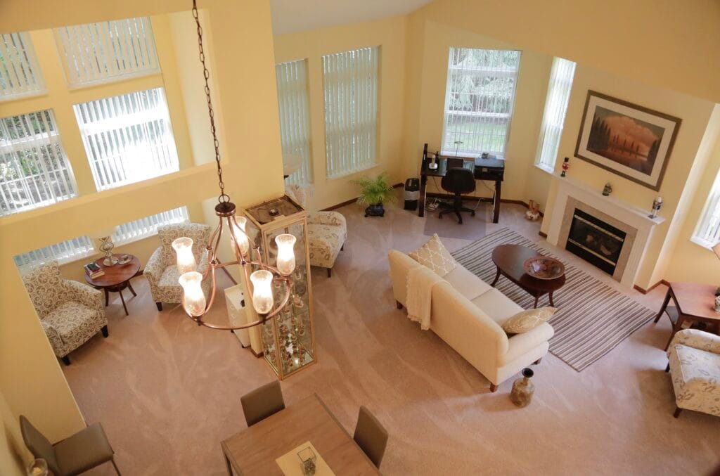 Spacious common area with seating and natural light.