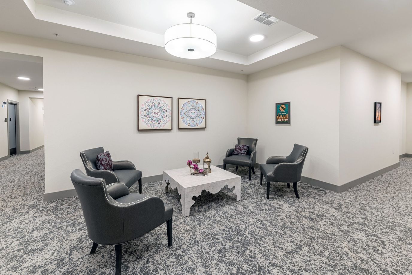 Cozy common area with seating and decorations.