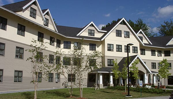 Exterior view of the Cathedral Square building with landscaping