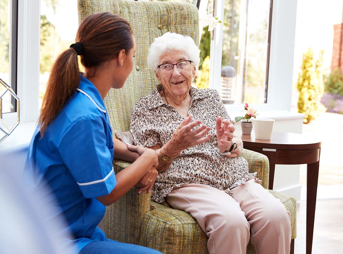 Caregiver and resident sharing a moment