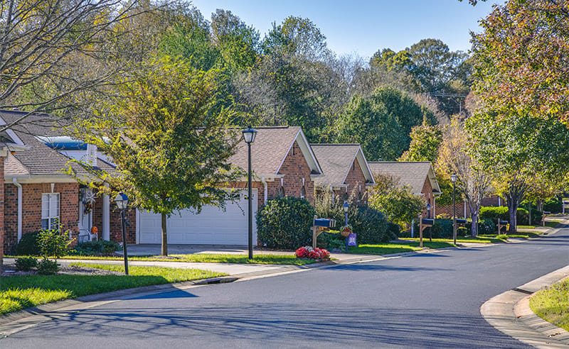 Quiet residential street with homes in a senior living community