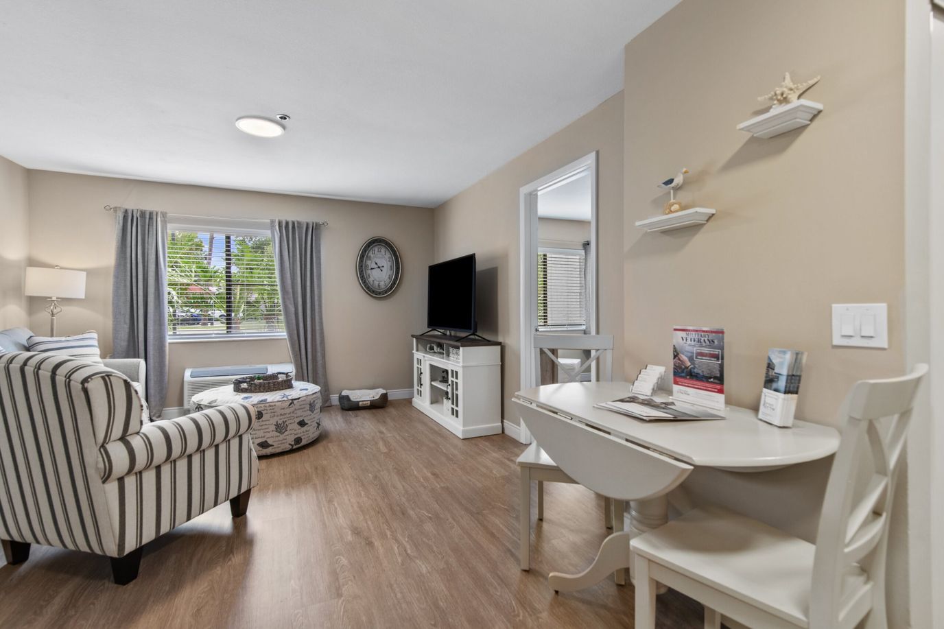 Cozy interior of a resident room with a small dining area