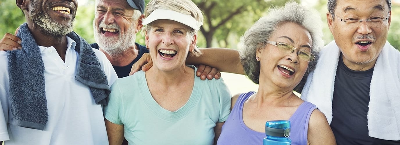 Group of residents enjoying time outdoors and laughing