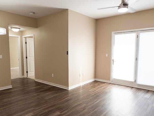 Bright interior living space with wood flooring
