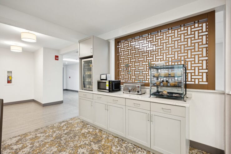Common area with a snack station and seating.