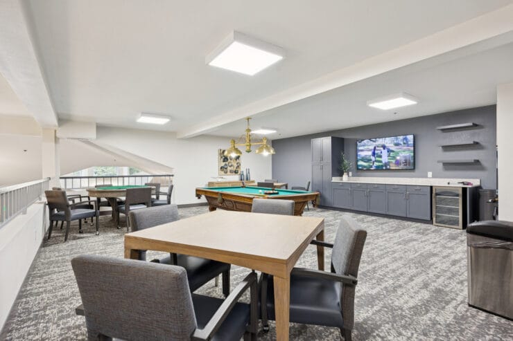 Interior common area with pool table and seating.
