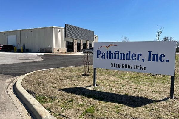 Exterior view of Pathfinder, Inc. building with signage
