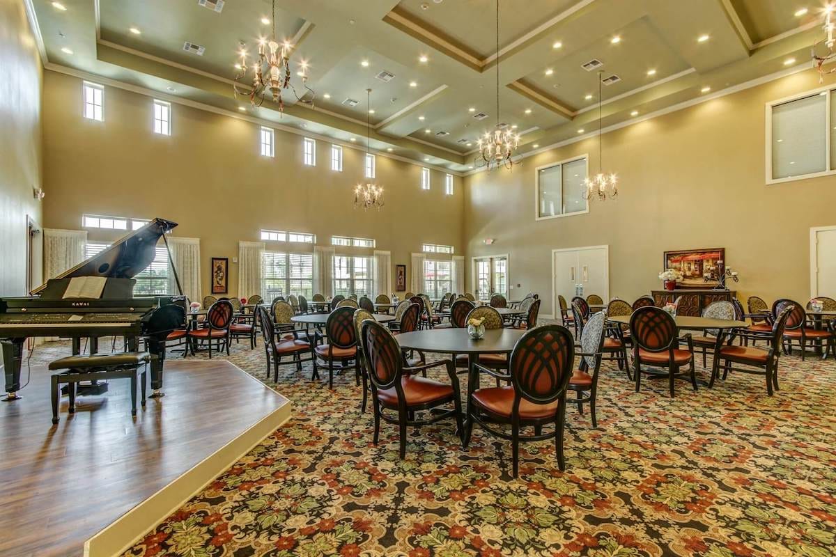Interior dining area with tables and piano