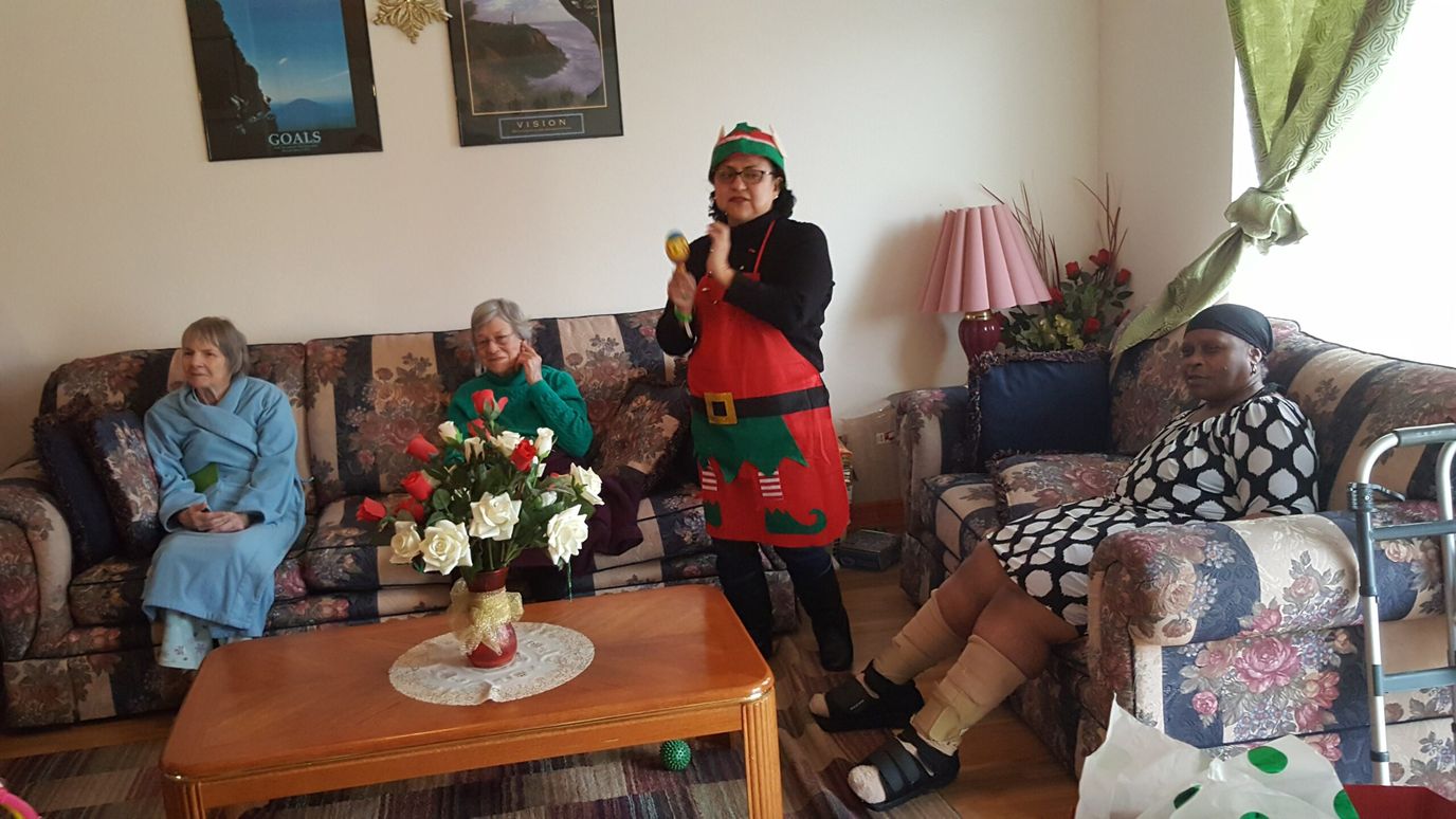 Residents enjoying a festive gathering in the common area