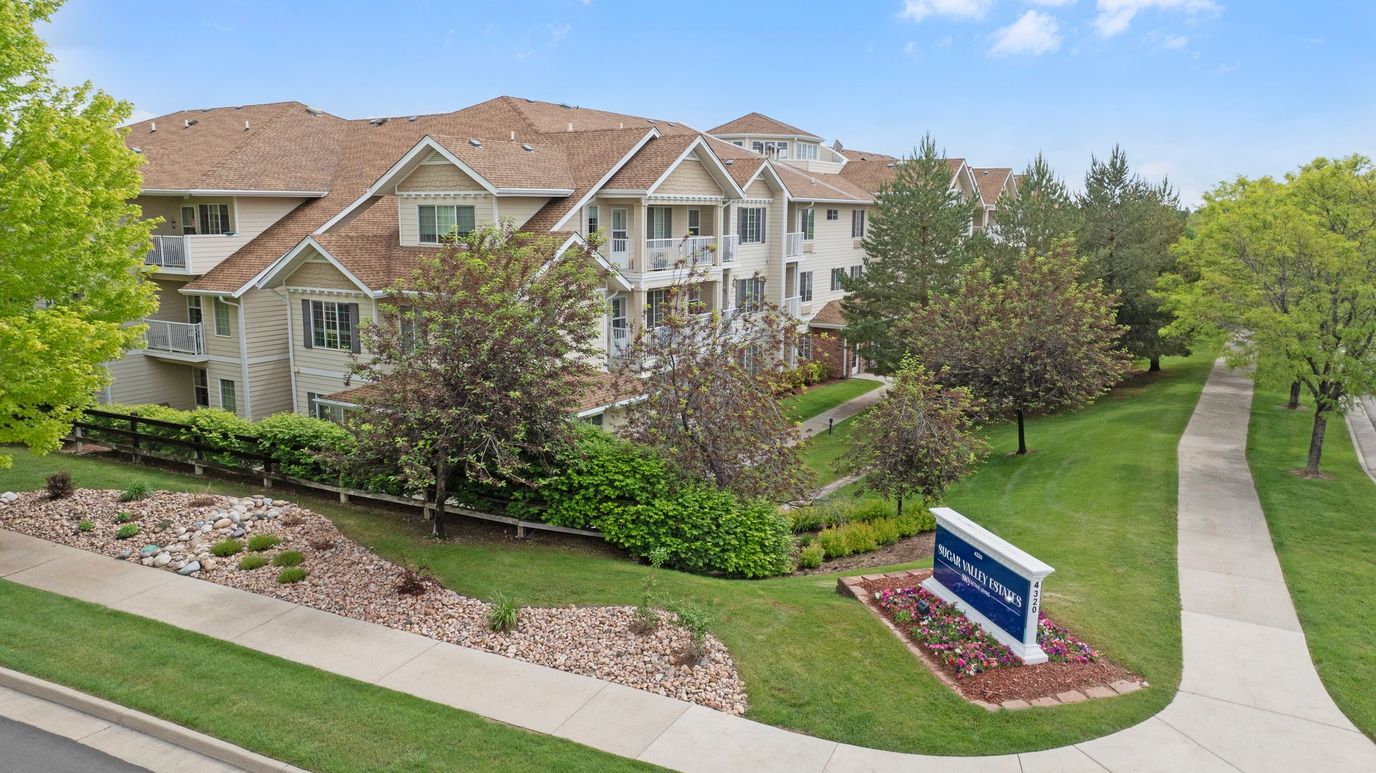 Exterior view of Parkwood Estates with landscaping