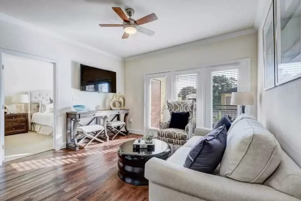 Bright common area with cozy seating and decor