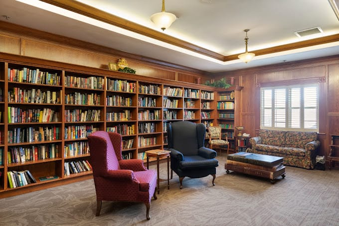 Interior view of the library with bookshelves and seating area