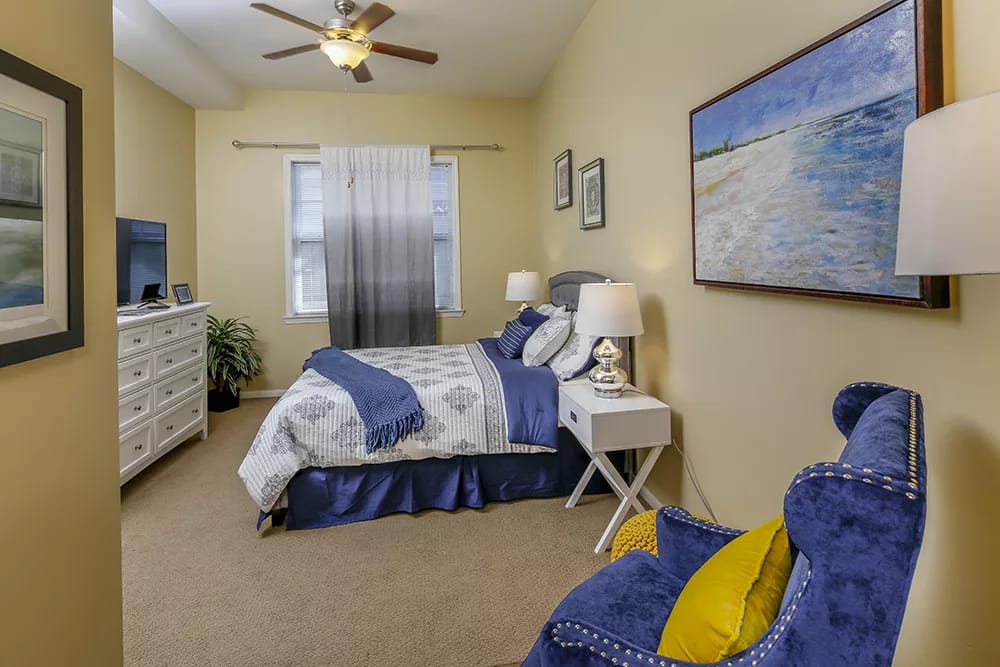 Comfortable bedroom with blue and white decor at Oak Cottage