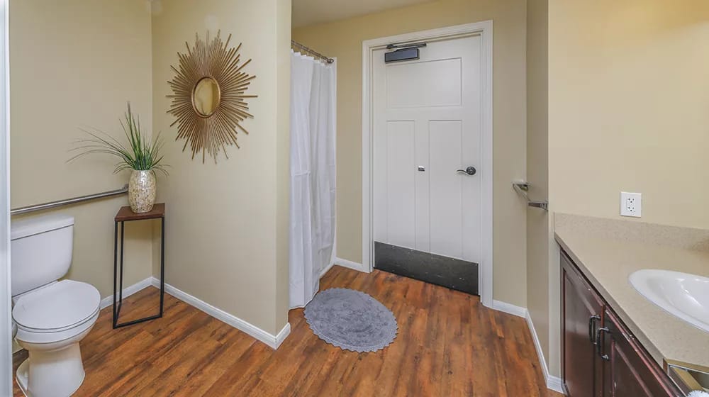 Bright and spacious bathroom with a shower and toilet