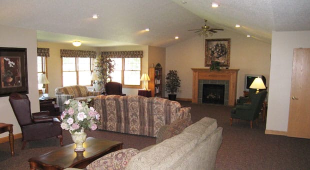 Spacious living room with comfortable seating and a fireplace