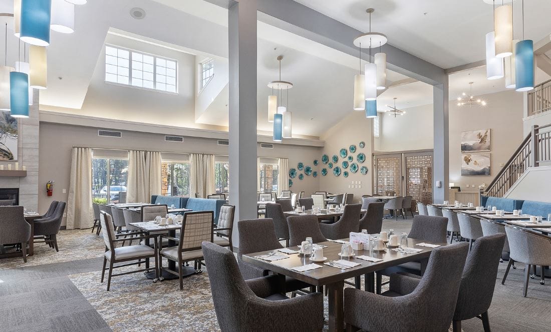 Bright dining area with tables set for meals