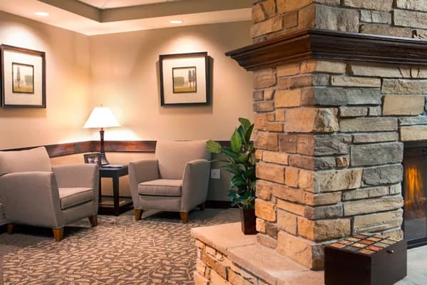 Comfortable seating and a cozy fireplace in the lounge