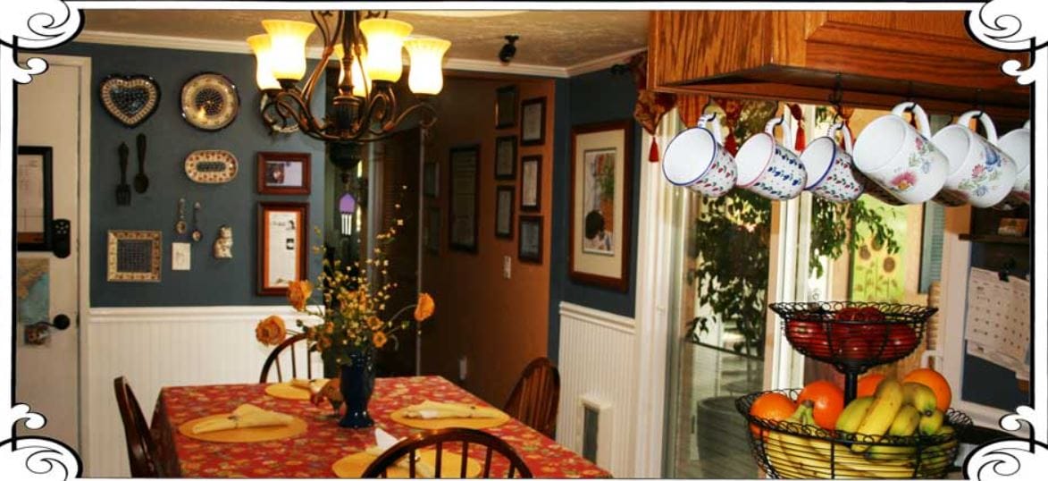 Dining table with floral centerpiece in a cozy kitchen