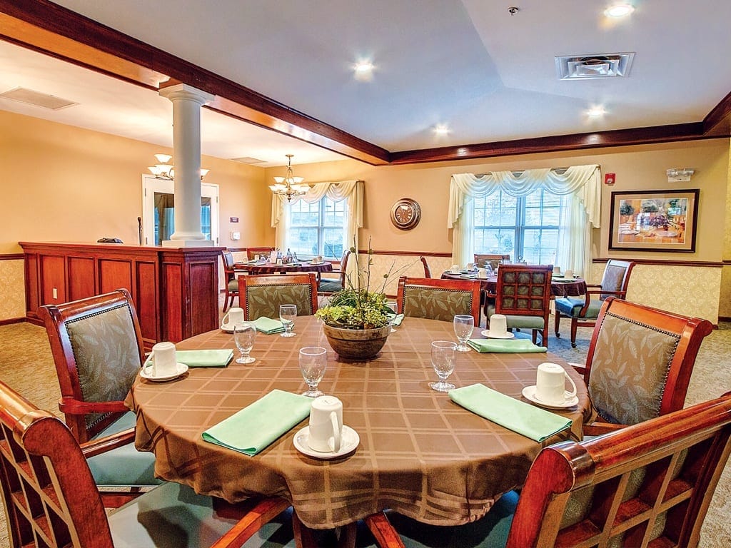 Cozy dining room setup with a large table and chairs
