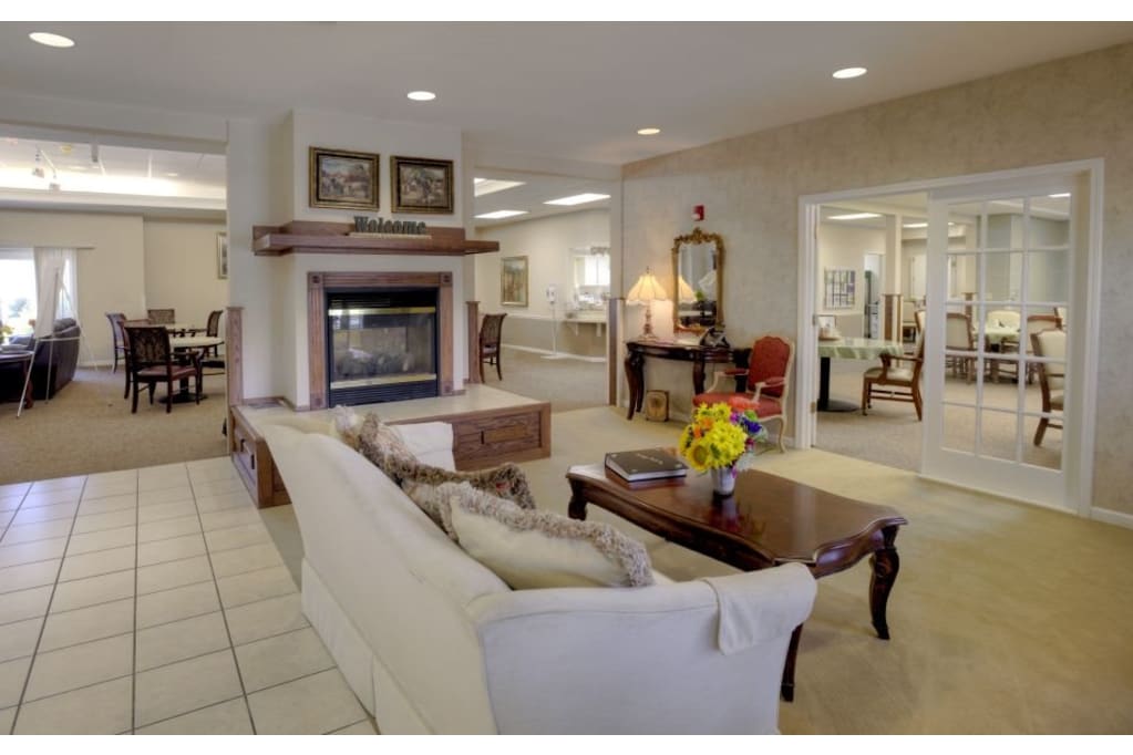 Welcoming living room with seating and fireplace