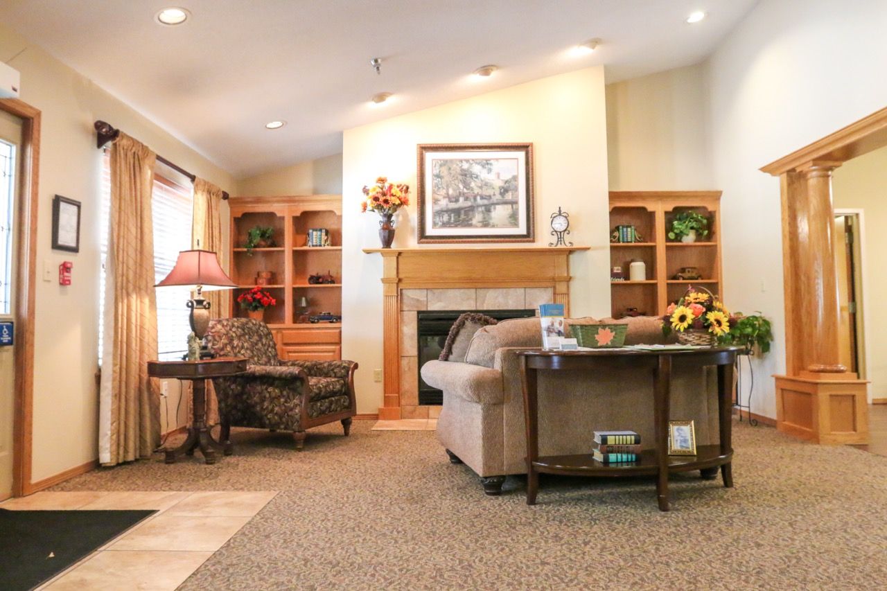 Cozy living room with comfortable seating and a fireplace