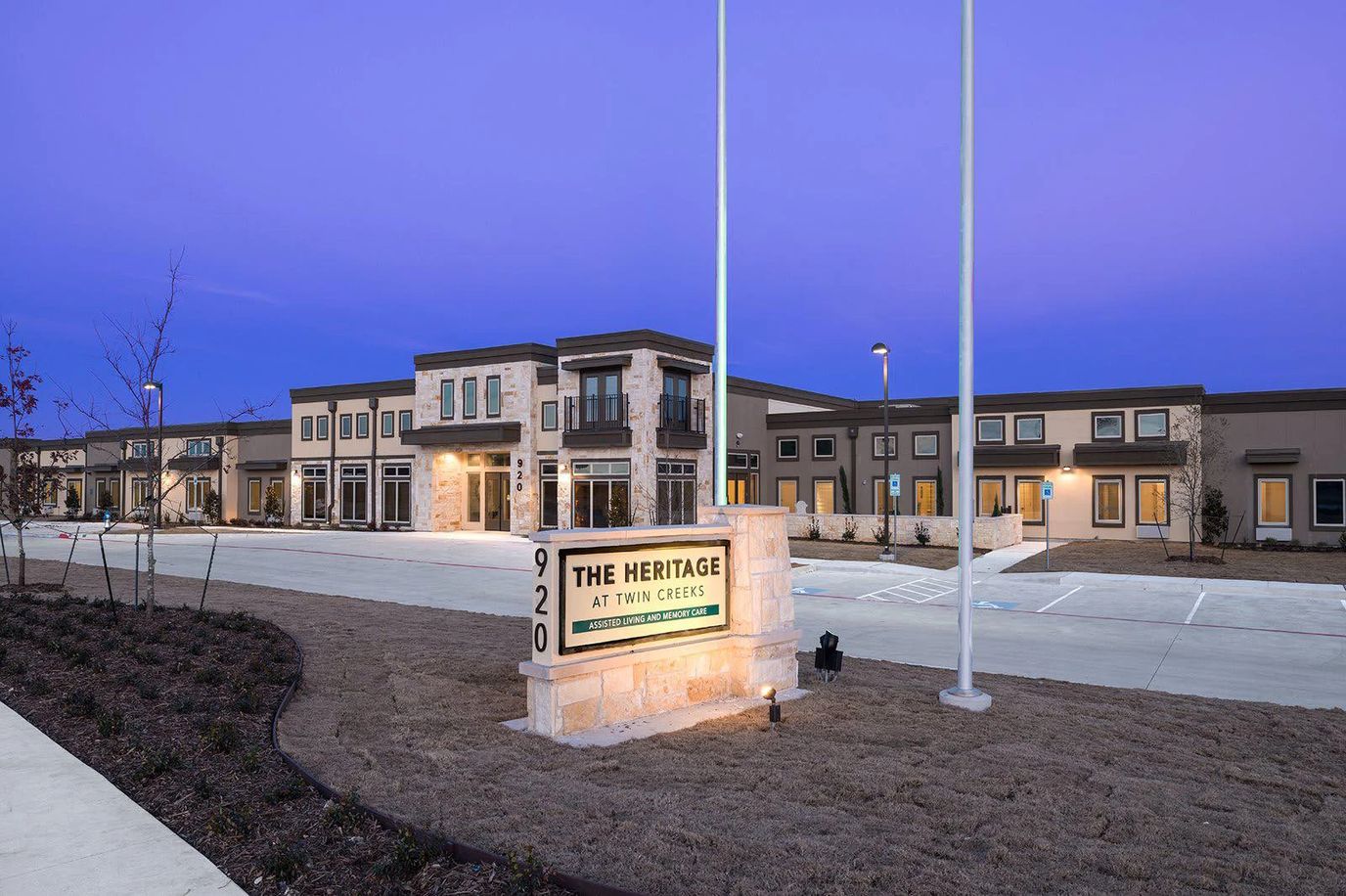 Exterior view of The Heritage at Twin Creeks at twilight
