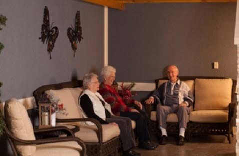Residents sitting together in a common area