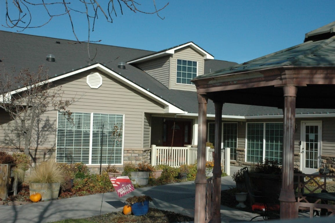 Front view of The Cottages of Middleton showing entrance and landscaped area.