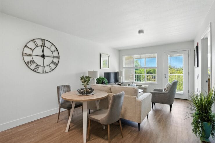 Welcoming interior space with a dining table and seating.