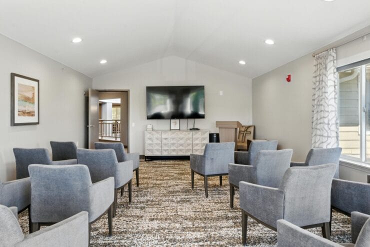 Common area with seating and TV