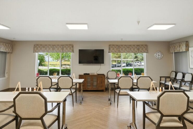 Common area with tables and TV