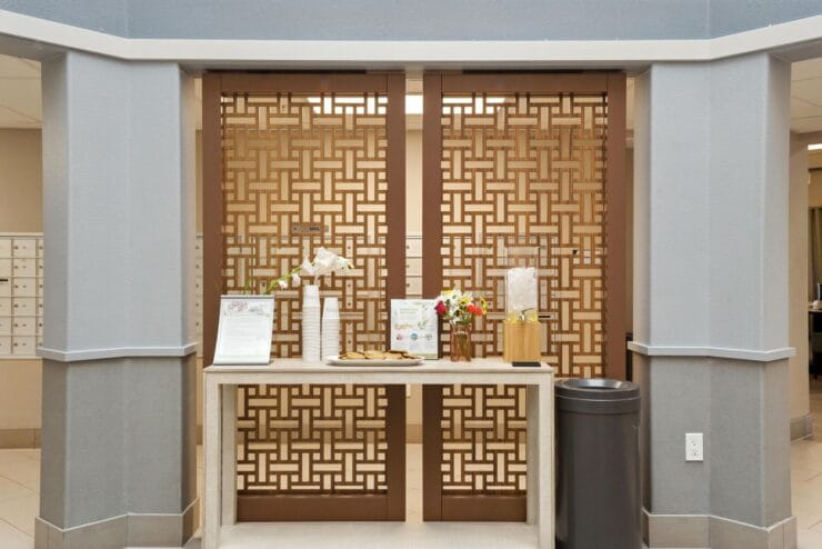 Interior view of a lobby area with decorative doors