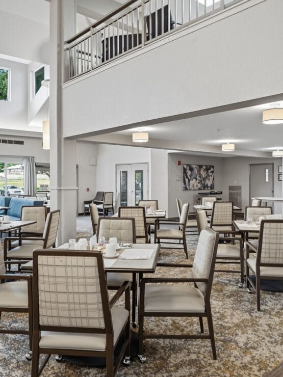 Bright dining area with tables and chairs