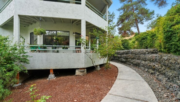 Pathway leading to an outdoor seating area.