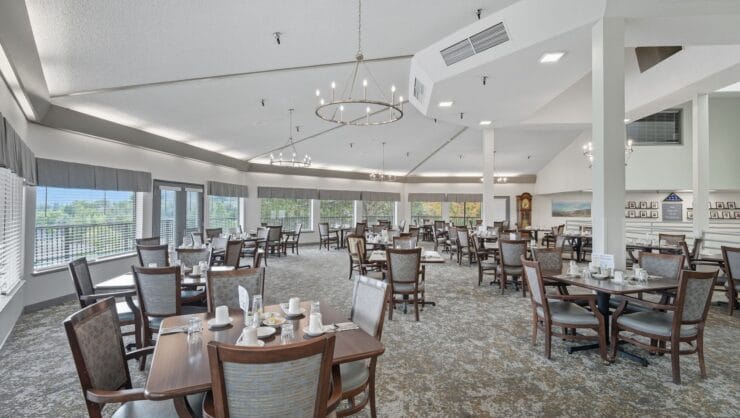 Dining area with tables set for breakfast