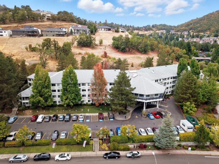 Aerial view of Solista Roseburg facility surrounded by trees.