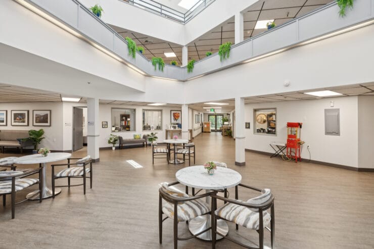 Bright common area with tables and seating