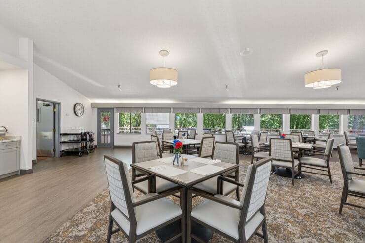 Bright dining area with tables and chairs