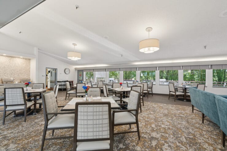 Bright dining area with tables and chairs