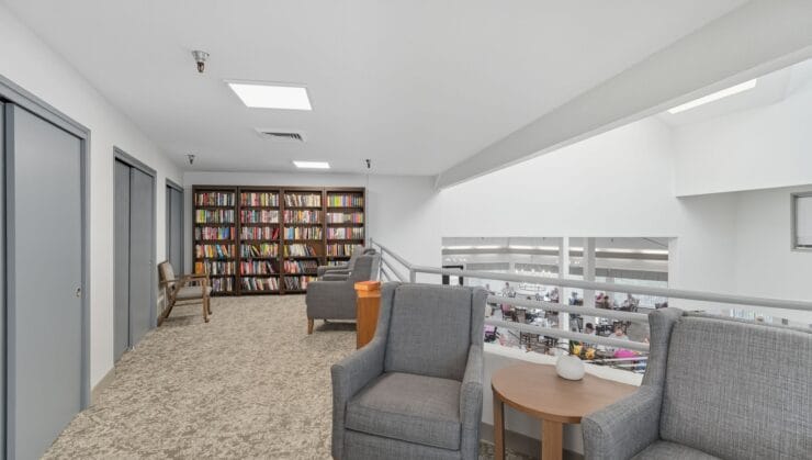 Common area with bookshelves and seating.