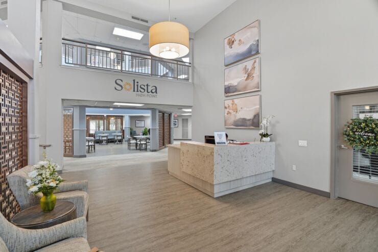 Welcoming lobby with reception and seating area