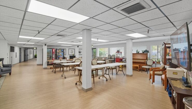 Bright common area with tables and seating