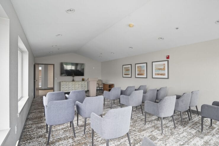 Interior common area with seating and television