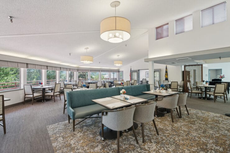 Dining area with tables and chairs for residents