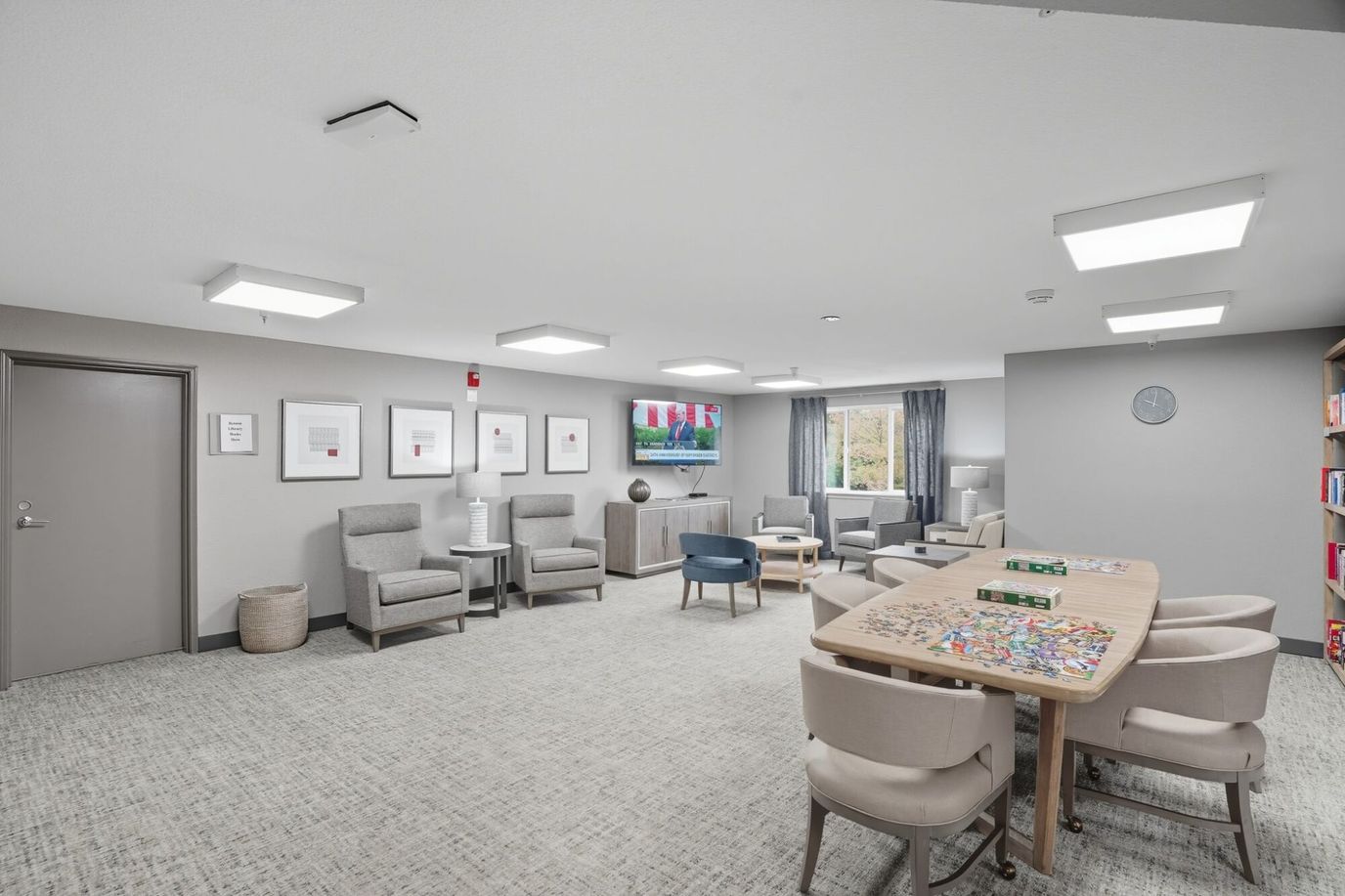 Common area with seating and a TV.