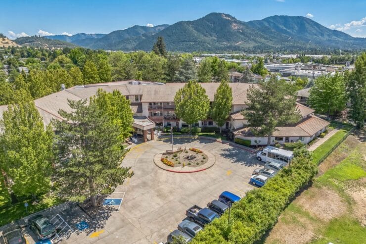 Aerial view of Solista Grants Pass facility with parking area.