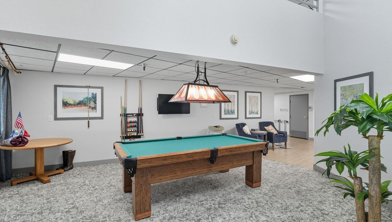 Pool table in a recreation area.