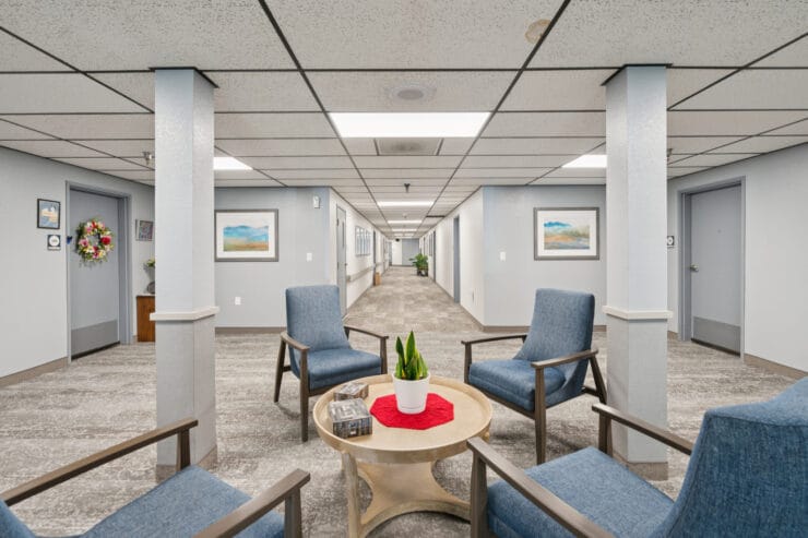 Interior corridor with seating and artwork